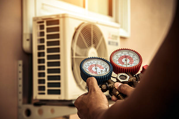 Professional Heat Pump Repair technician working in Andrews, SC